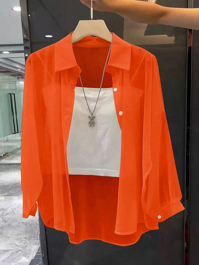 orange transparent minimalist long sleeve button up shirt