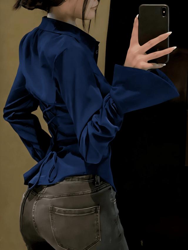 elegant solid color shirt with unique back tie