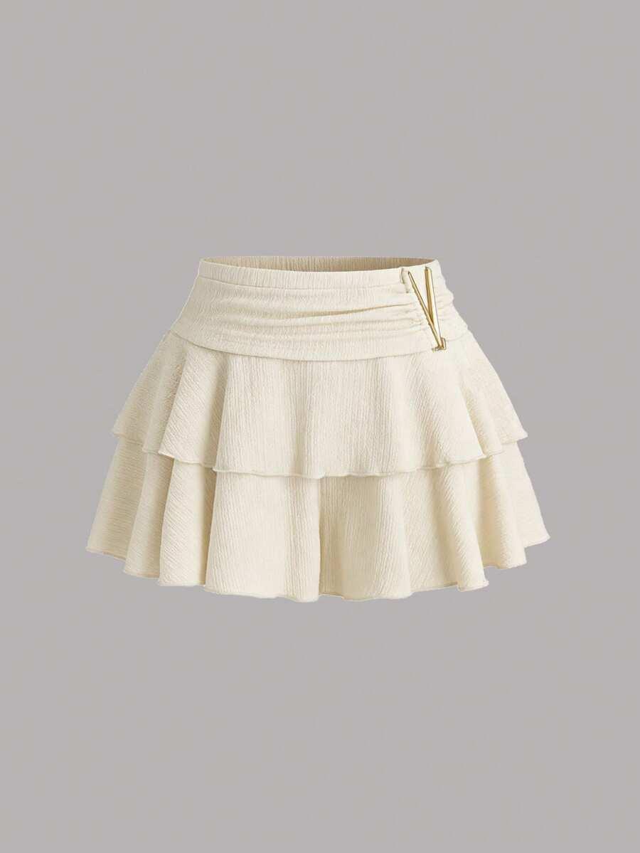 textured beige ruffled minimalist skort with metal decor