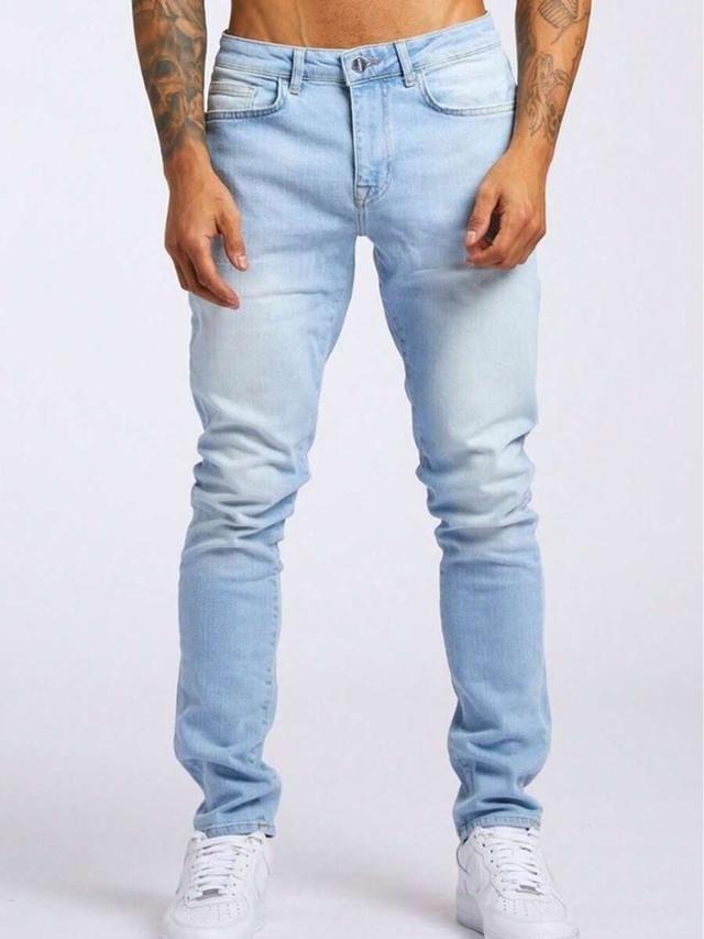 fashionable light blue washed denim jeans