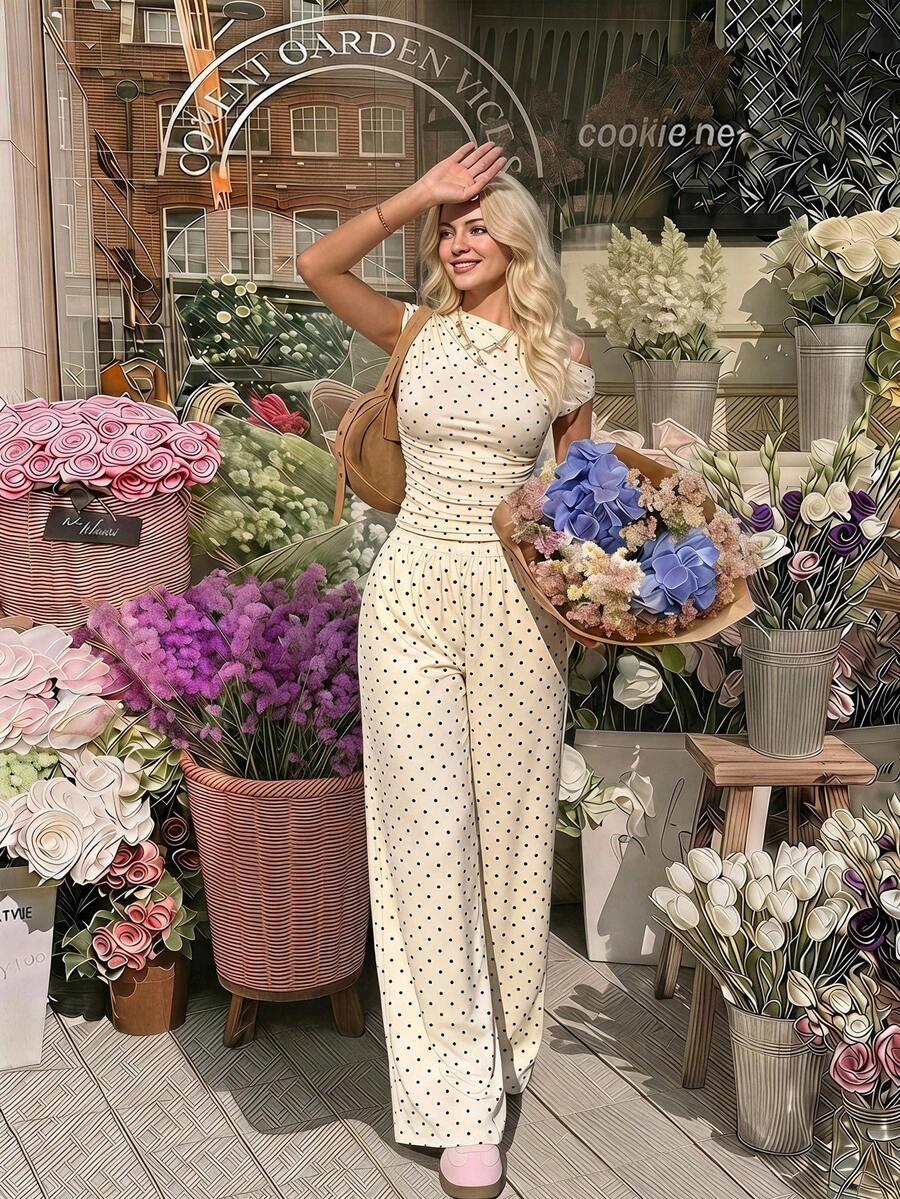 polka dot ruched asymmetrical top and wide-leg trousers