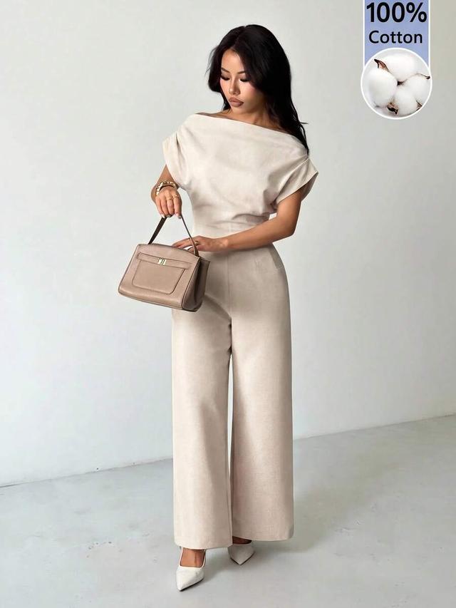 light beige cotton off-shoulder blouse and wide leg pants