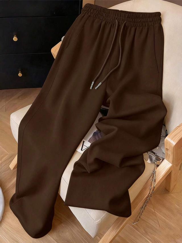 brown minimalist drawstring waist relaxed fit sweatpants