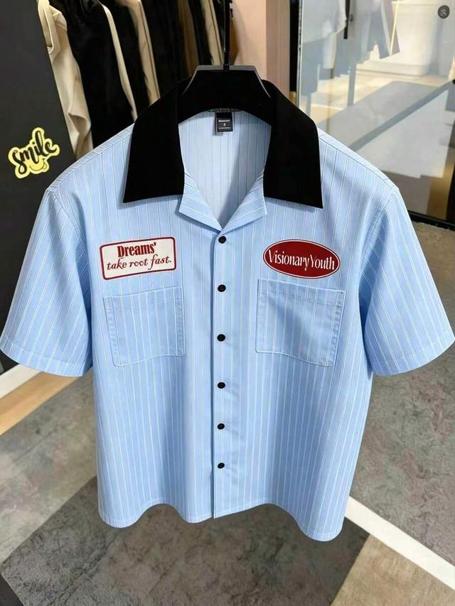 blue short sleeve striped button-up shirt