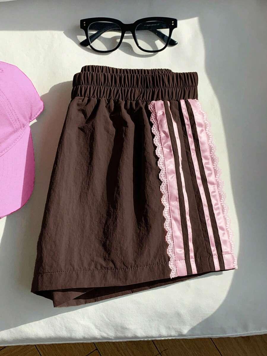 brown elastic waist shorts with pink lace trim