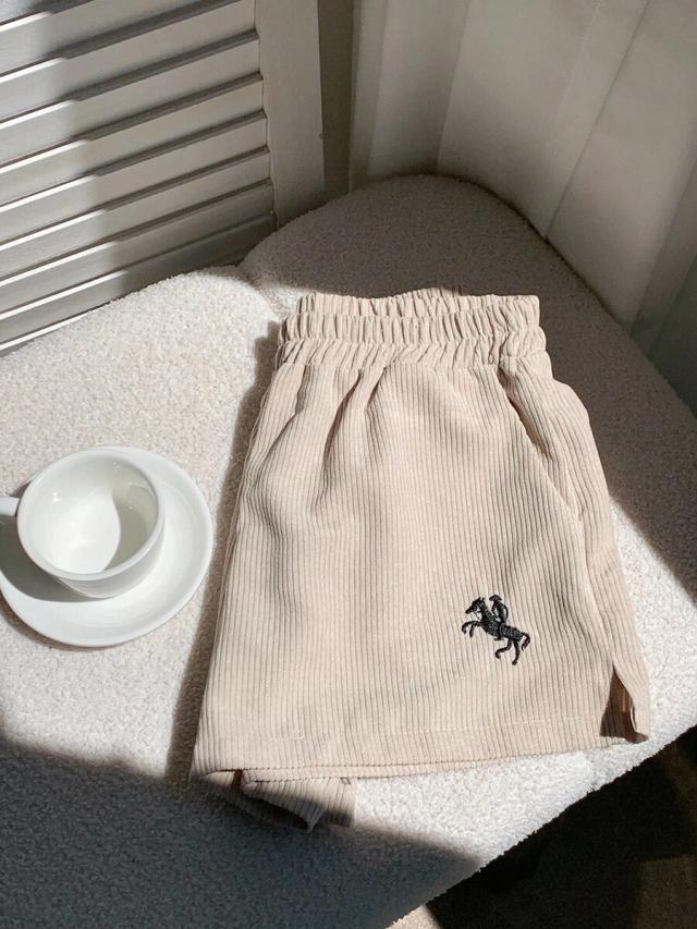 apricot corduroy wide-leg shorts with embroidered detail