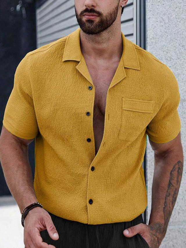 mustard yellow textured short-sleeved button-up shirt