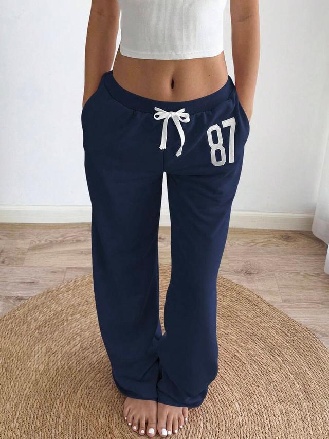 navy blue embroidered drawstring straight leg sweatpants