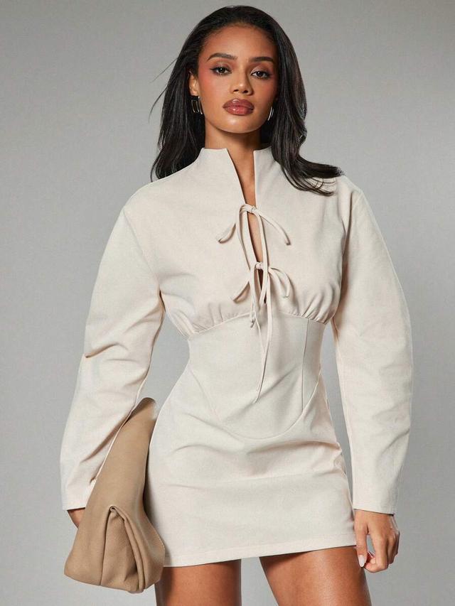 beige high neck front tie long sleeve tailored dress