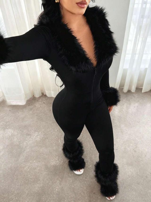 black zip-front jumpsuit with faux fur trim