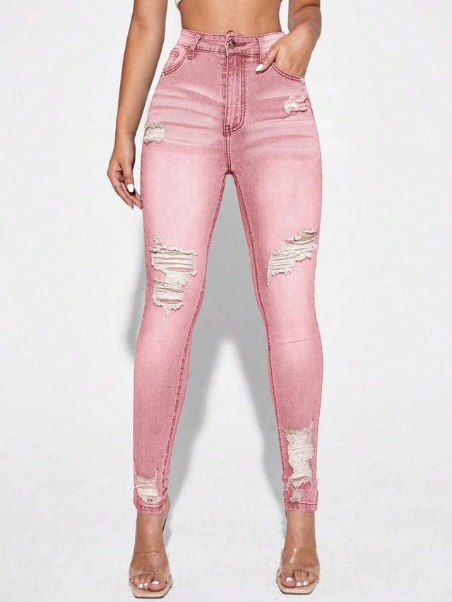 pink distressed skinny fit denim jeans