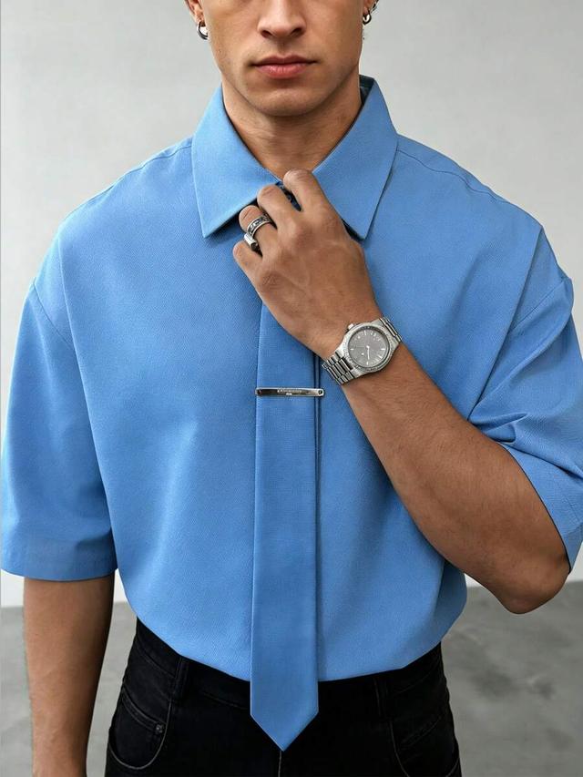 men's blue woven short sleeve drop shoulder shirt