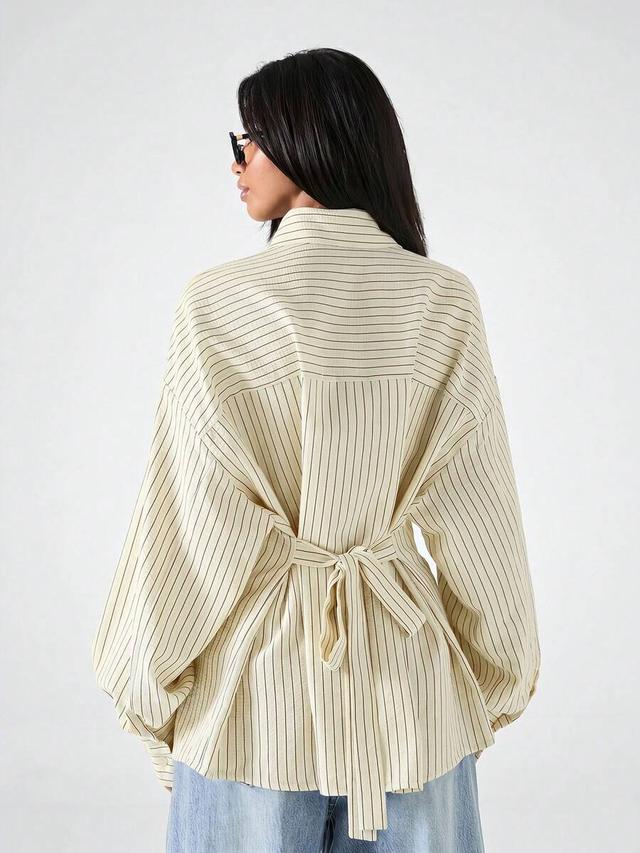 minimalist beige striped loose backless tie-front blouse