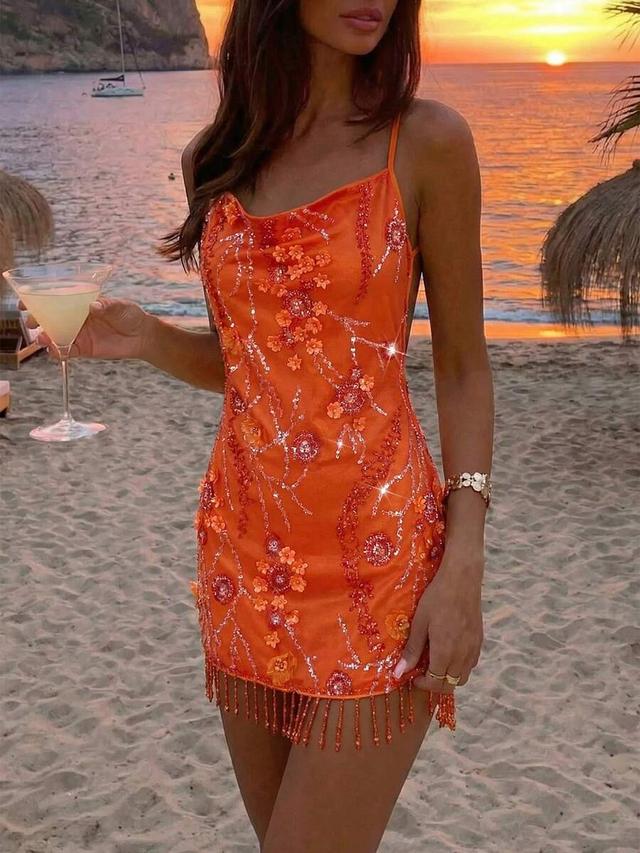 orange satin mini dress with floral beadwork and fringe