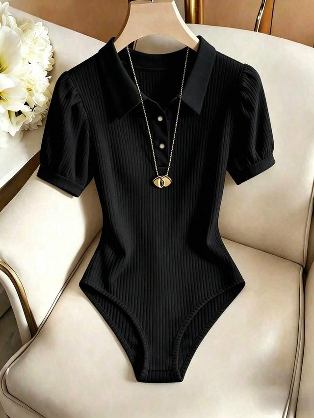 black ribbed collared bodysuit with pearl buttons