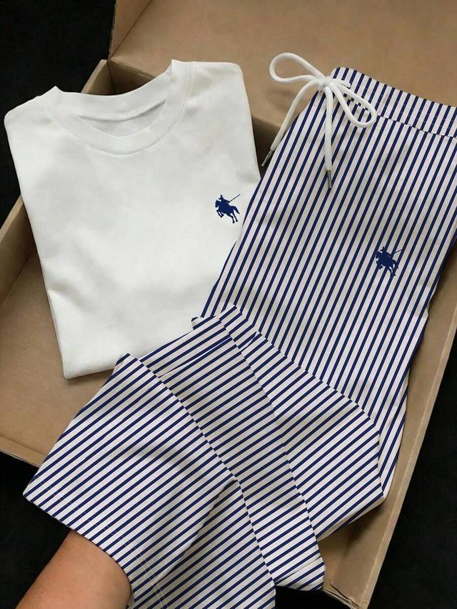 embroidered round neck short sleeve top and striped pants