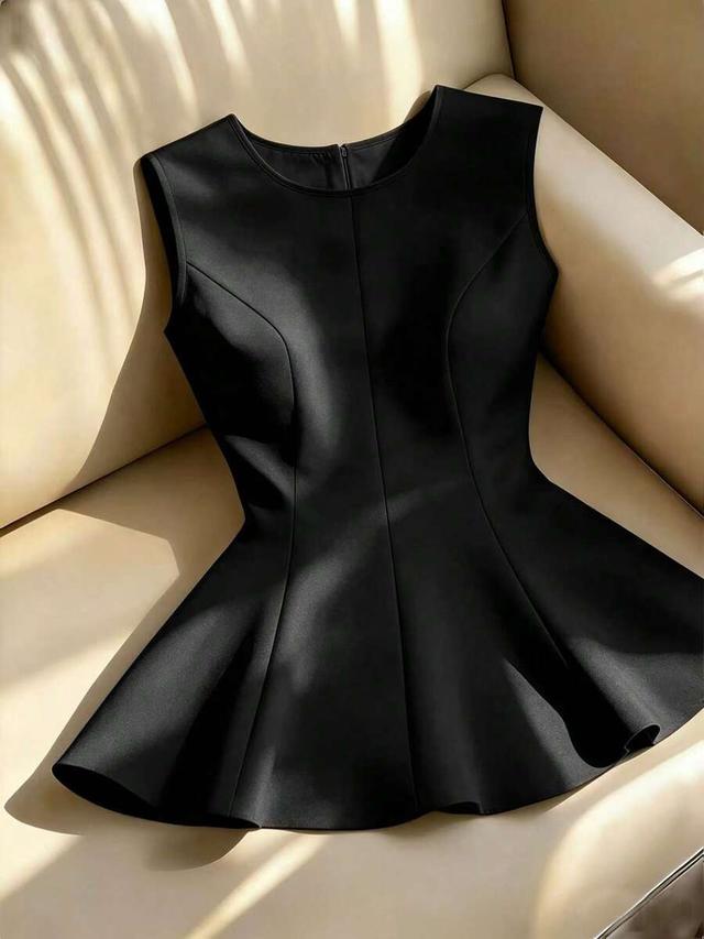 elegant black peplum waist-cinching sleeveless top