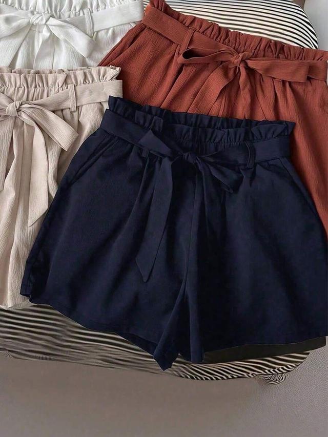 white casual belted paperbag waist shorts