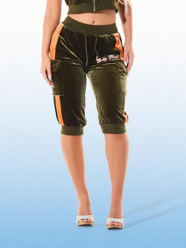 olive velour cargo capri joggers with orange side panels
