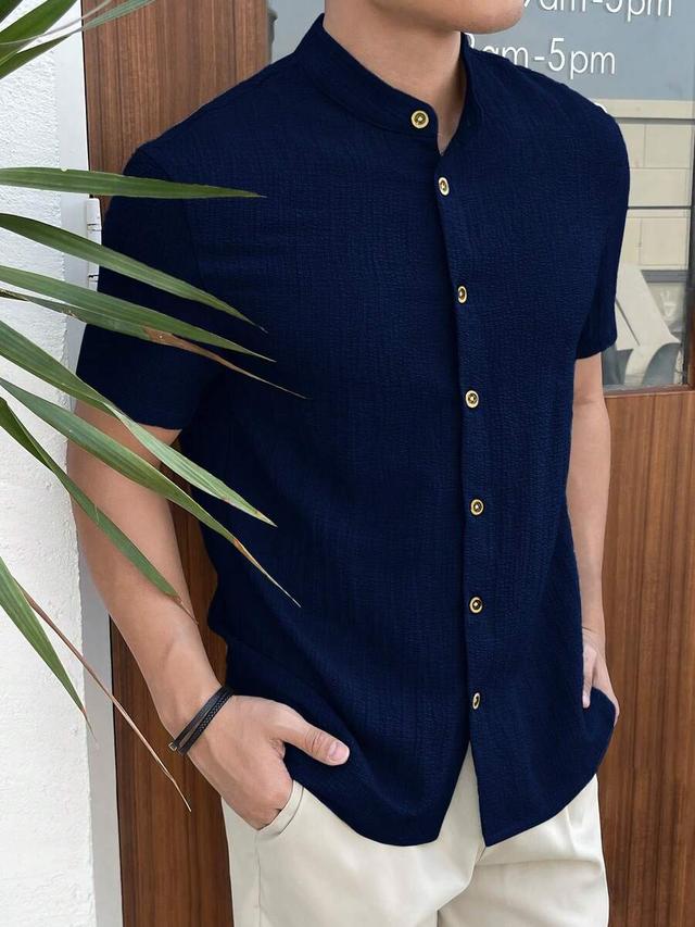navy blue textured short sleeve grandad collar shirt
