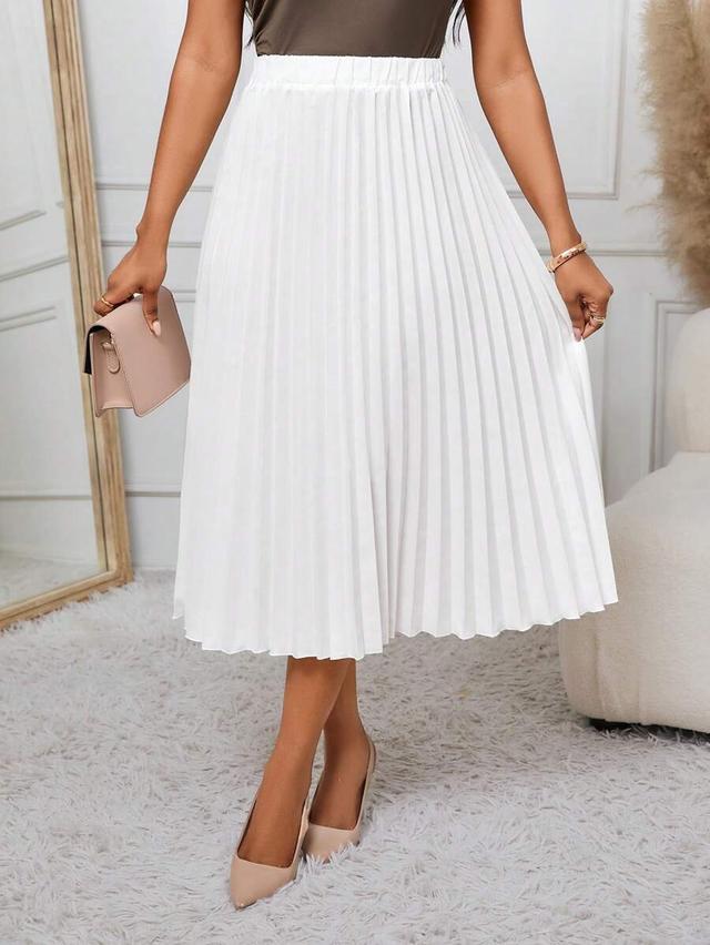 white pleated midi skirt