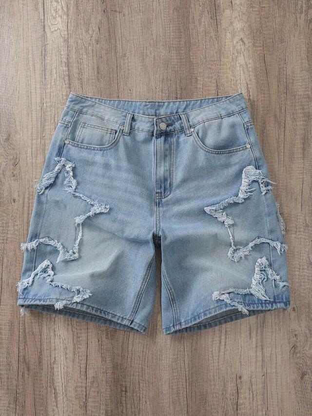 light wash denim shorts with distressed star patches
