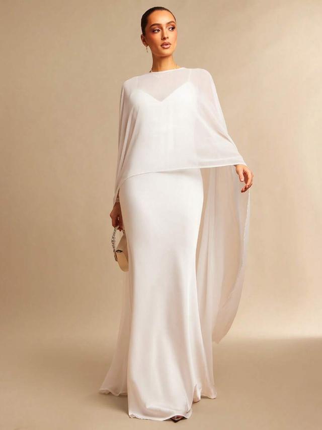 off-white satin fishtail gown with chiffon cape overlay