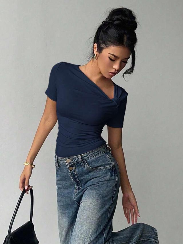 siren gaze asymmetric neckline short sleeve fitted top