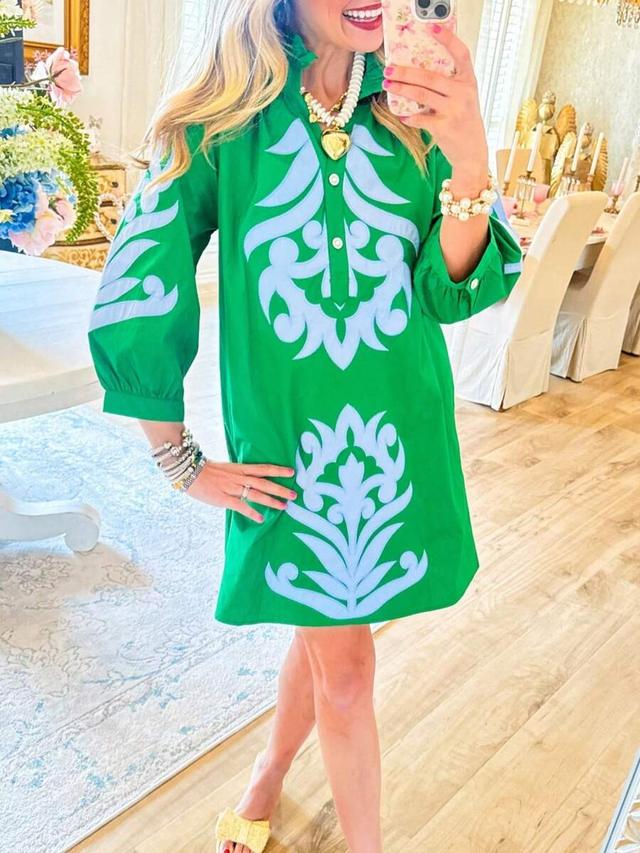 green cotton shirt dress with light blue applique