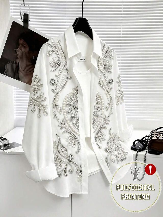 white button-up blouse with faux pearl and crystal embellishment
