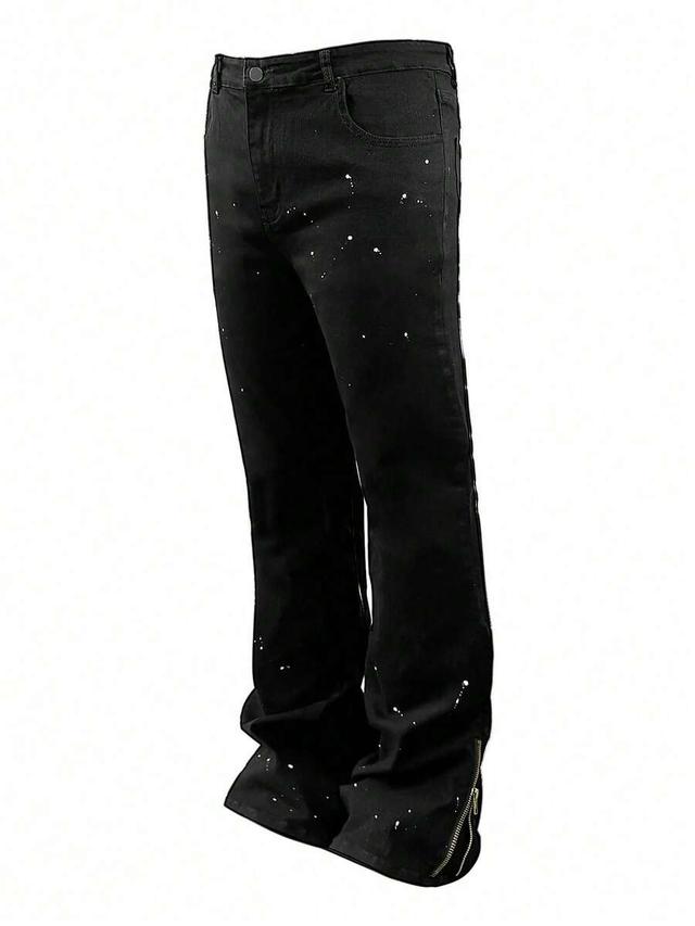 black washed denim jeans with paint splatter and zippers