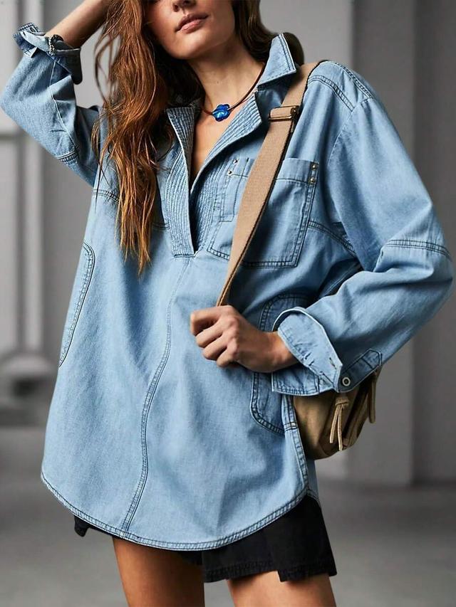 light wash denim pullover jacket with pleated placket