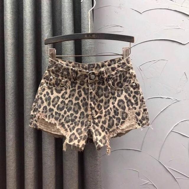 leopard print high-waisted frayed denim shorts