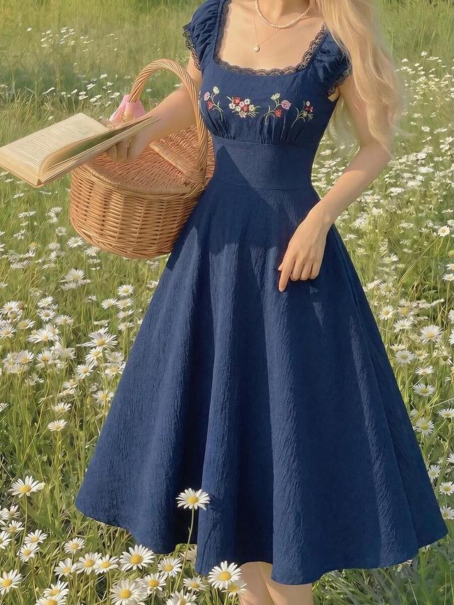 navy blue embroidered shell sleeve mid-length dress