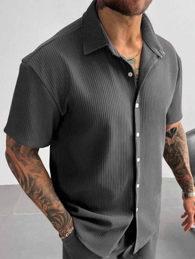 textured solid color ribbed knit short sleeve lapel shirt