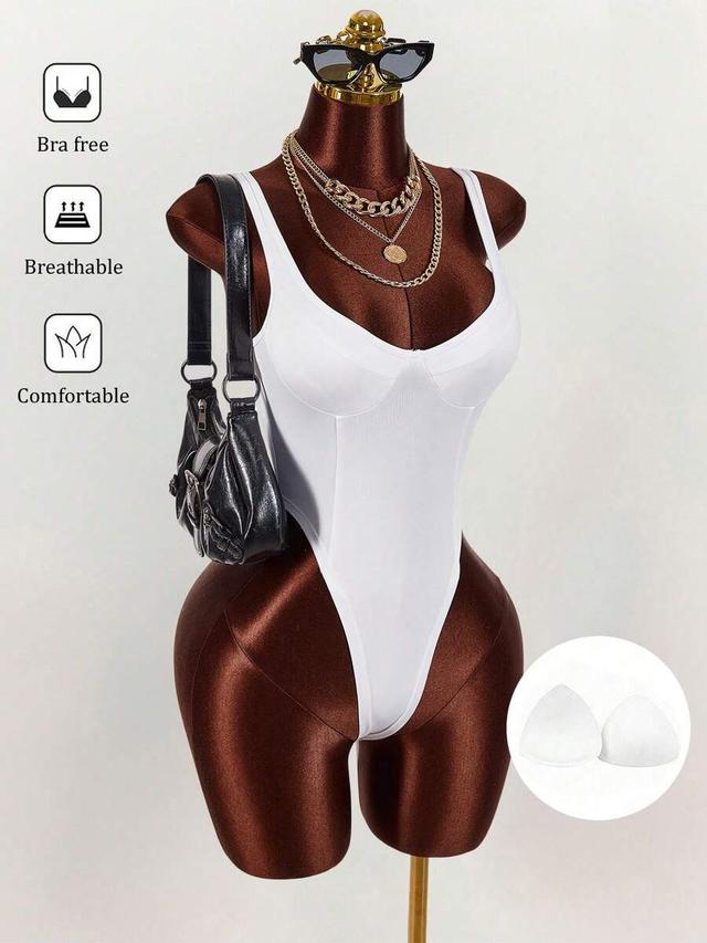 solid white low-cut padded activewear bodysuit