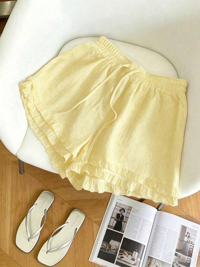 layered ruffled lace tie-up shorts in yellow