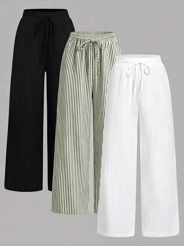 white pleated wide leg trousers with elastic waist