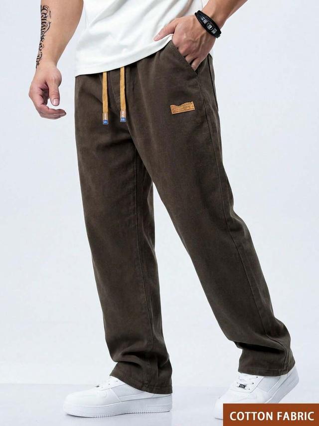 men's brown washed denim elastic waist drawstring jeans
