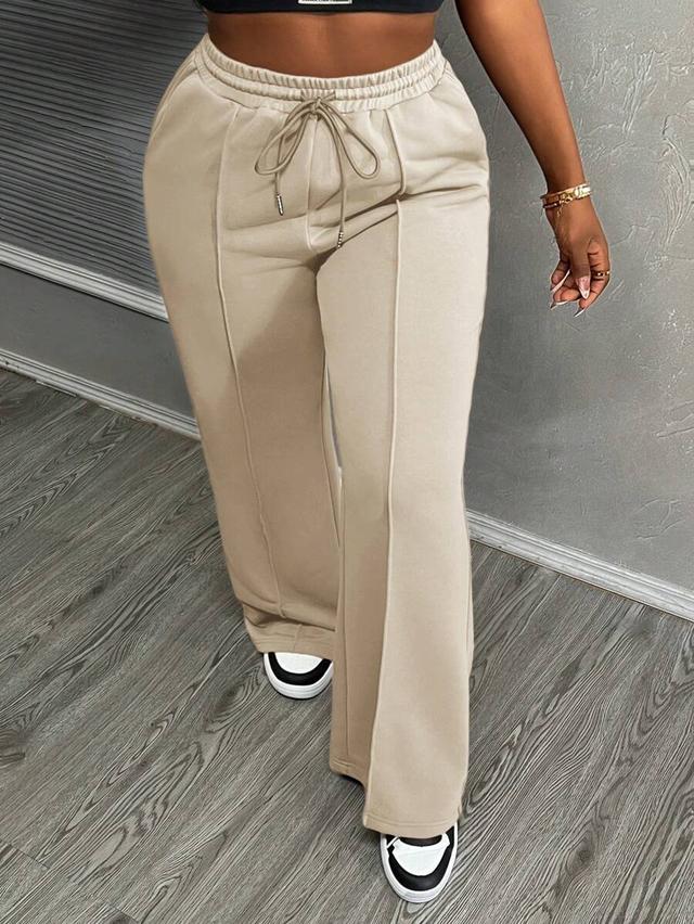 beige drawstring waist pleated flare sweatpants