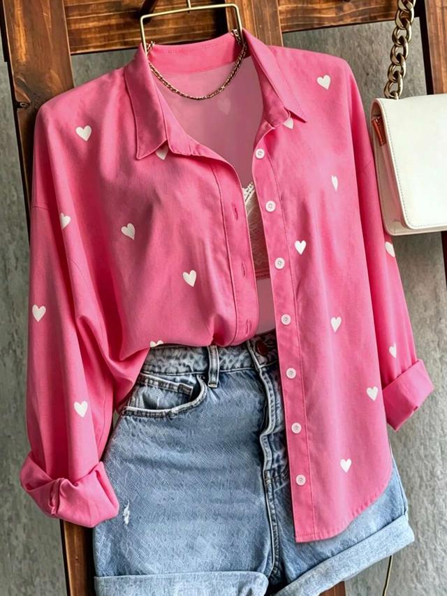 pink and white heart print long sleeve shirt