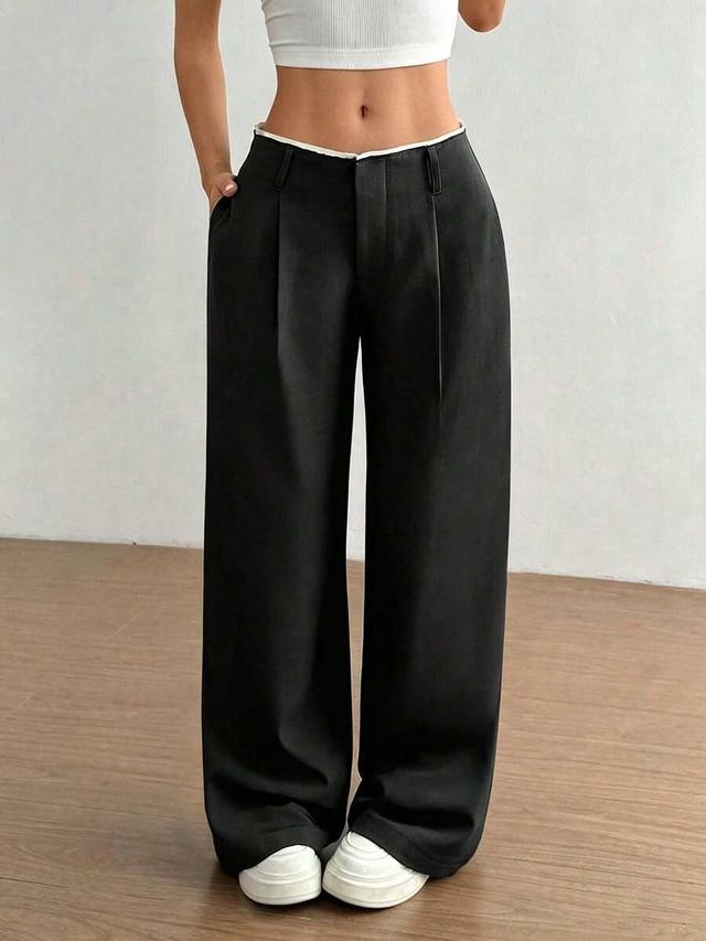 versatile black draped straight leg trousers