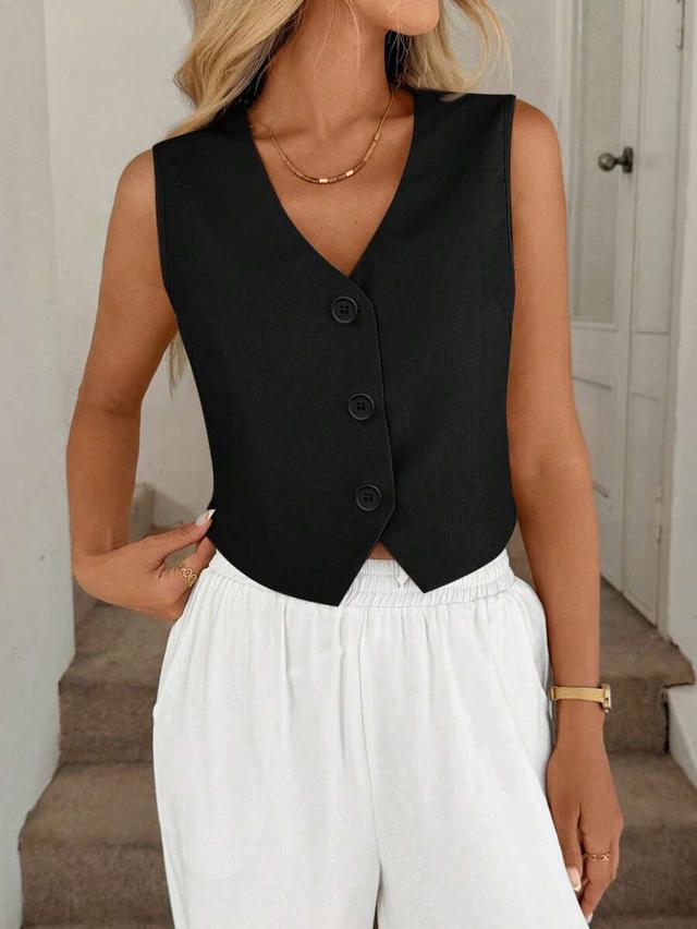 black sleeveless tailored vest blouse