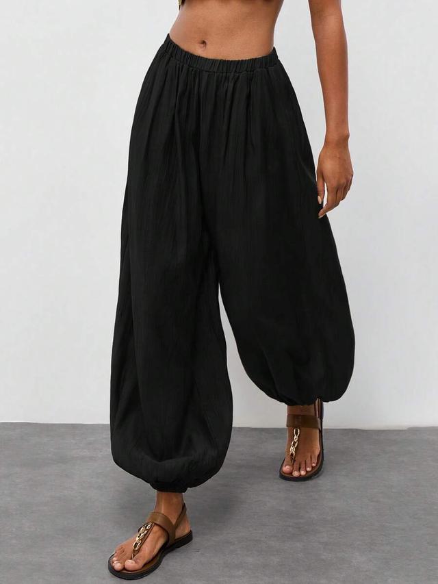 maija solid black casual relaxed fit trousers