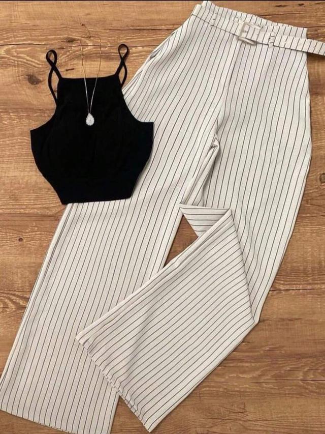 black sleeveless crop top and striped trousers set