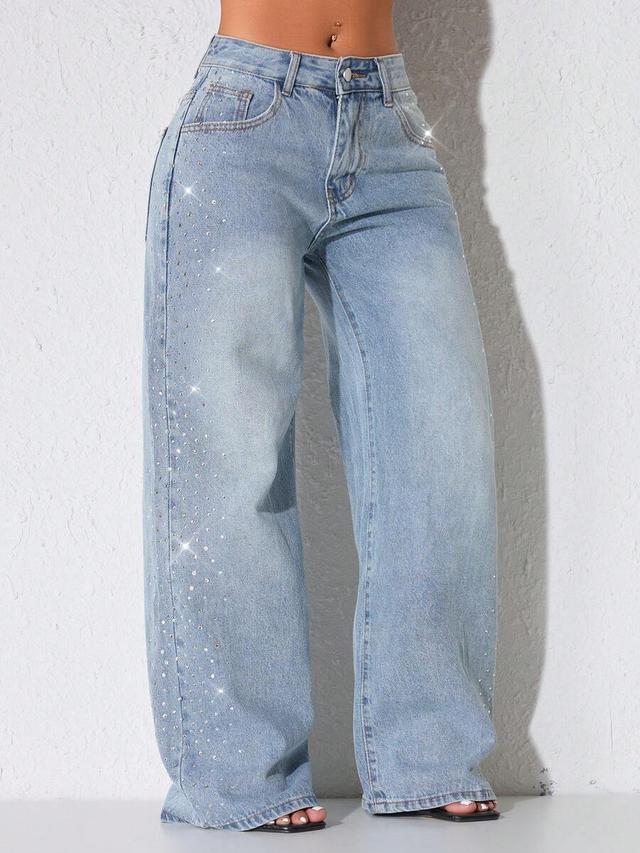 light wash denim jeans with rhinestone side detailing