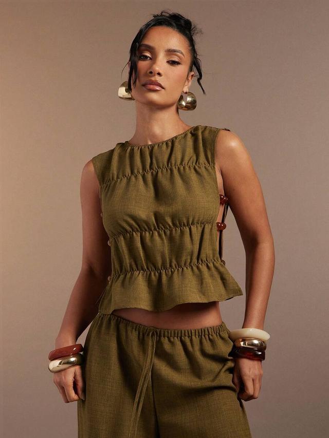 olive green linen blend sleeveless tank with side cutouts