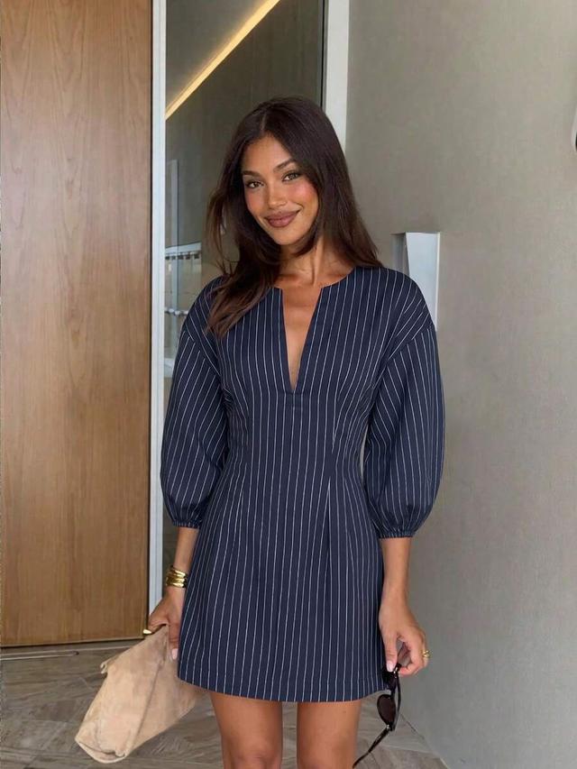 navy pinstripe v-neck mini dress with puff sleeves