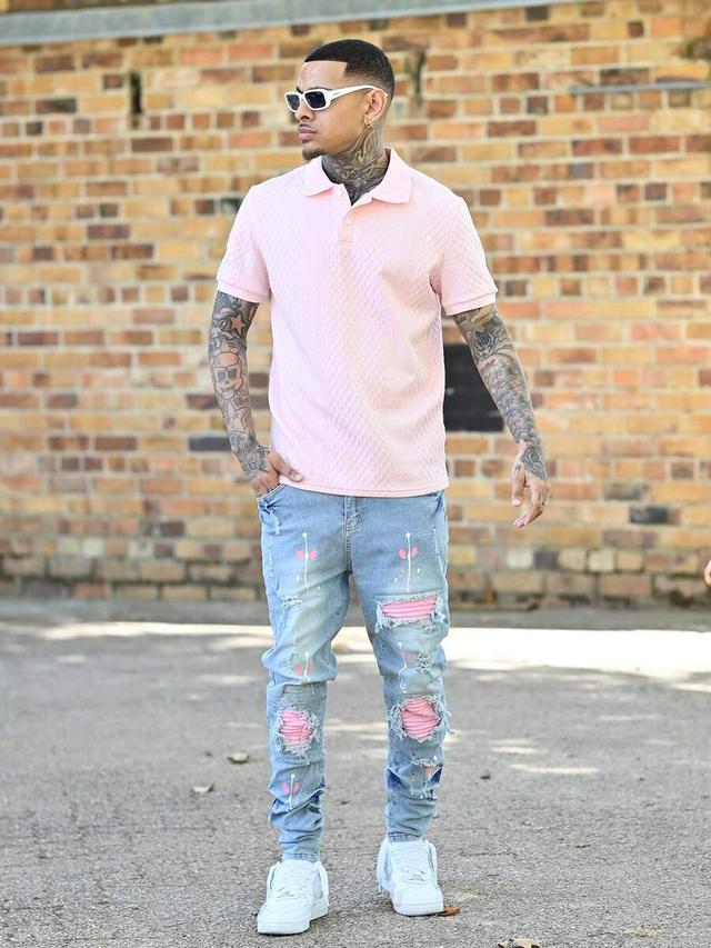 pink skinny jeans with paint splatter and patches