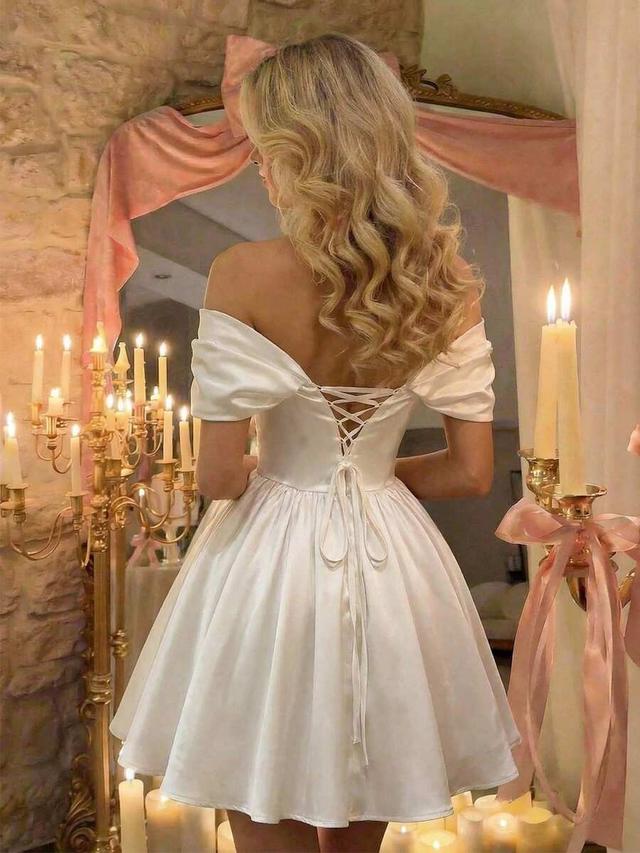 elegant white off shoulder satin mini dress